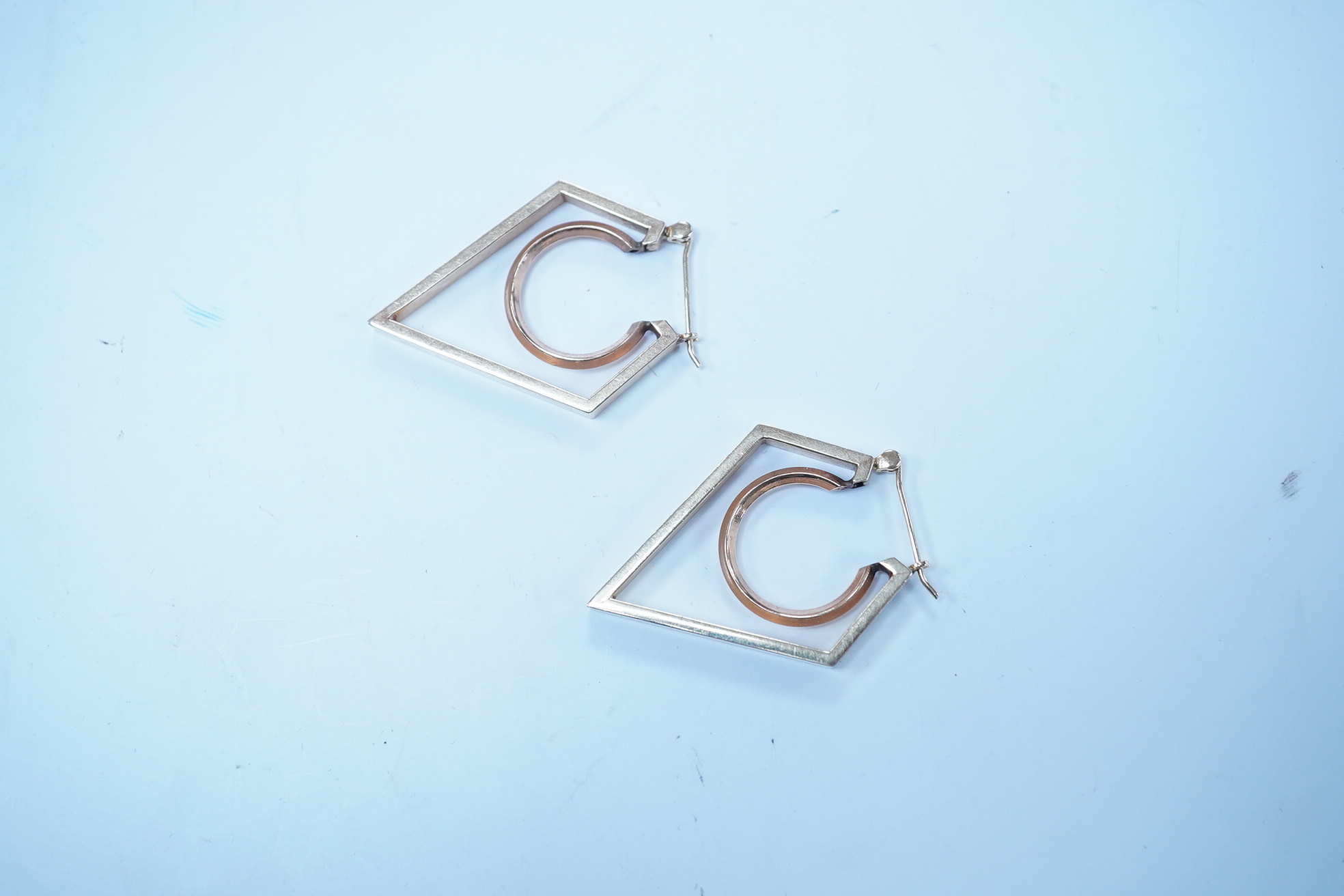 A modern pair of two colour yellow metal geometric earrings, 38mm, 5.7 grams. Condition - fair to good